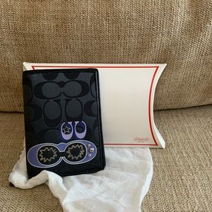 Coach passport holder